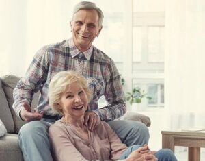 An older couple smiling | Living Wills & Advanced Healthcare Directives