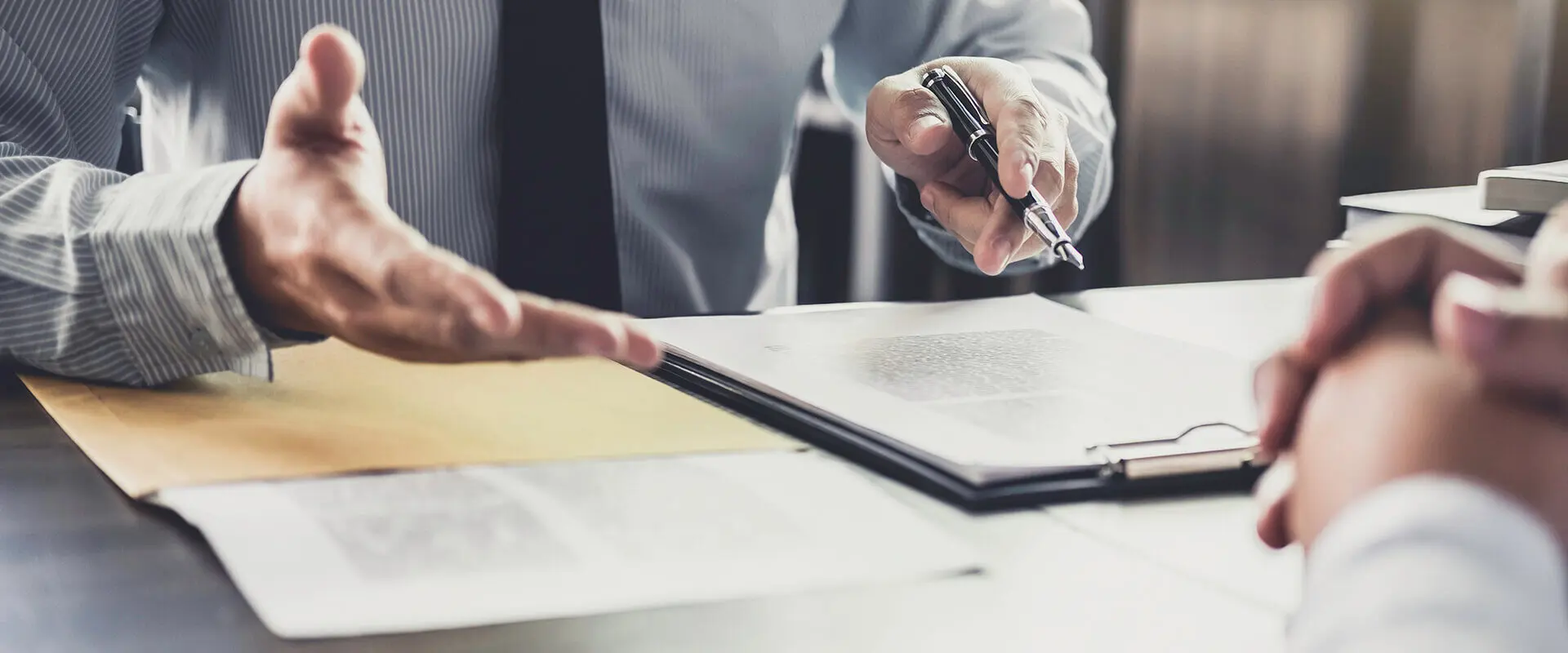 man meeting with divorce attorney