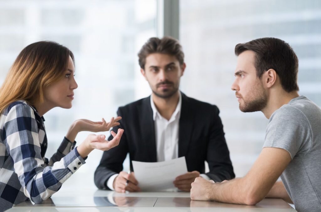 Couple at table arguing