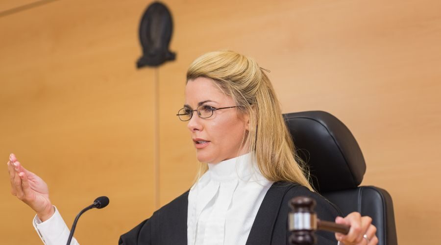 Female Judge sitting down speaking