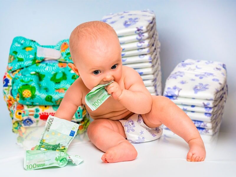 Baby chewing on euros