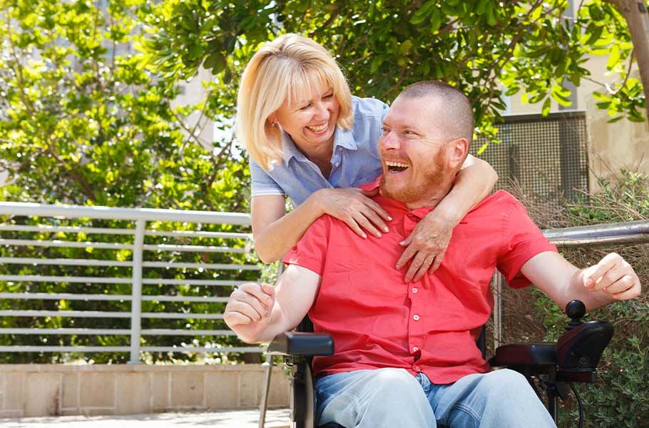 mother hugging her special needs son