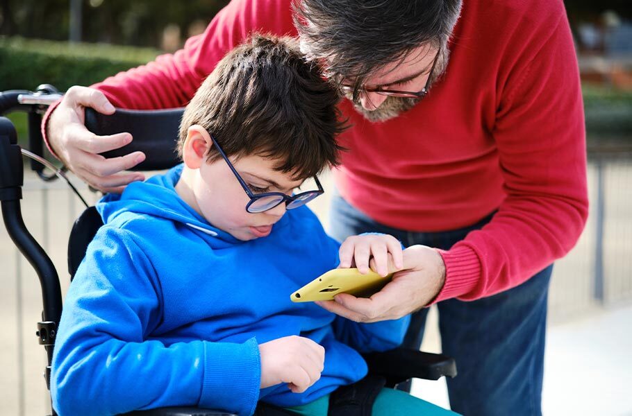 a father helping his son with special needs