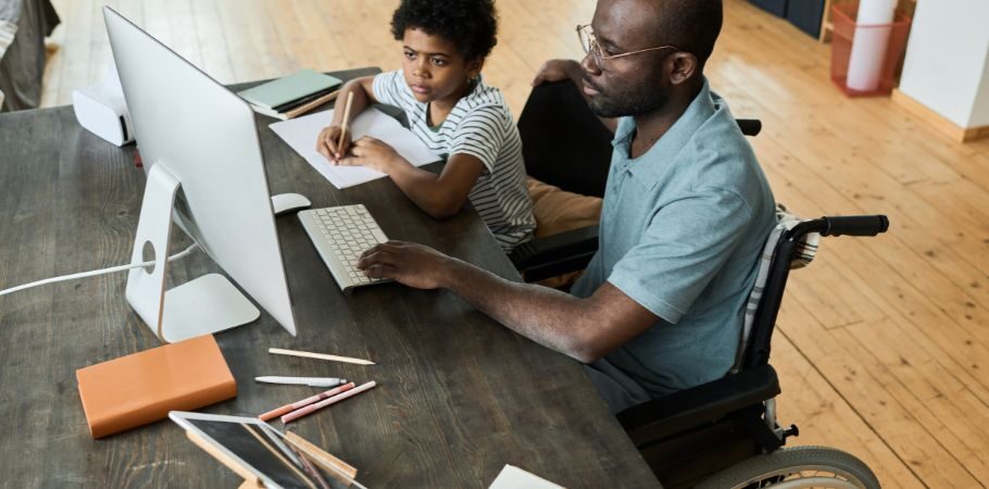 Handicap father drawing with his son