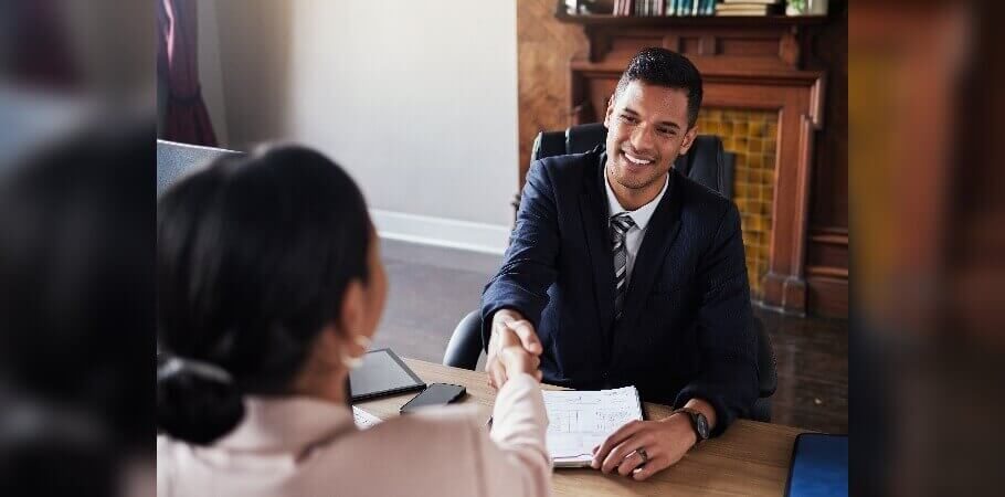 attorney shaking hands with a client