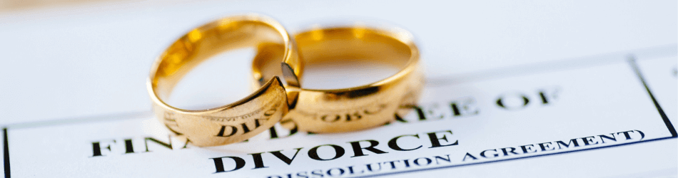 Wedding rings on divorce paperwork