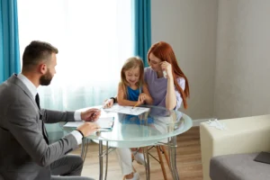 Woman meets with lawyer to file child support modification petition