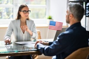 A divorce lawyer in Fairfax speaking with a client.