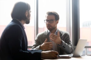 A divorce modification lawyer in Chesterfield County speaking with a client.