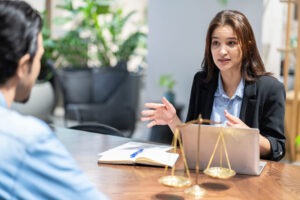 A family lawyer in Loudoun County speaking with a client.