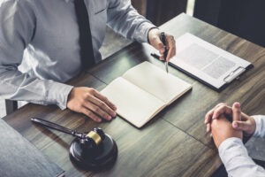 A family lawyer in Chesapeake speaking with a client.