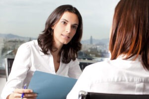 A divorce lawyer in Chesterfield County speaking with a client.