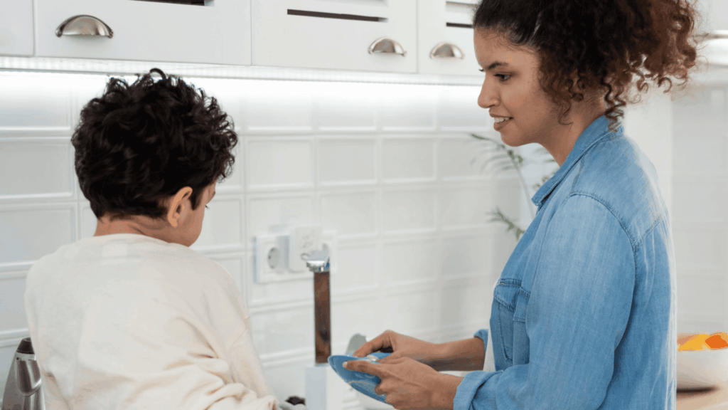 Mother & Child doing dishes together