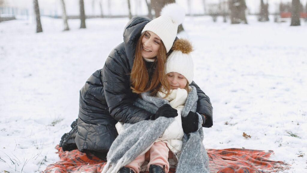A mother and daughter in winter